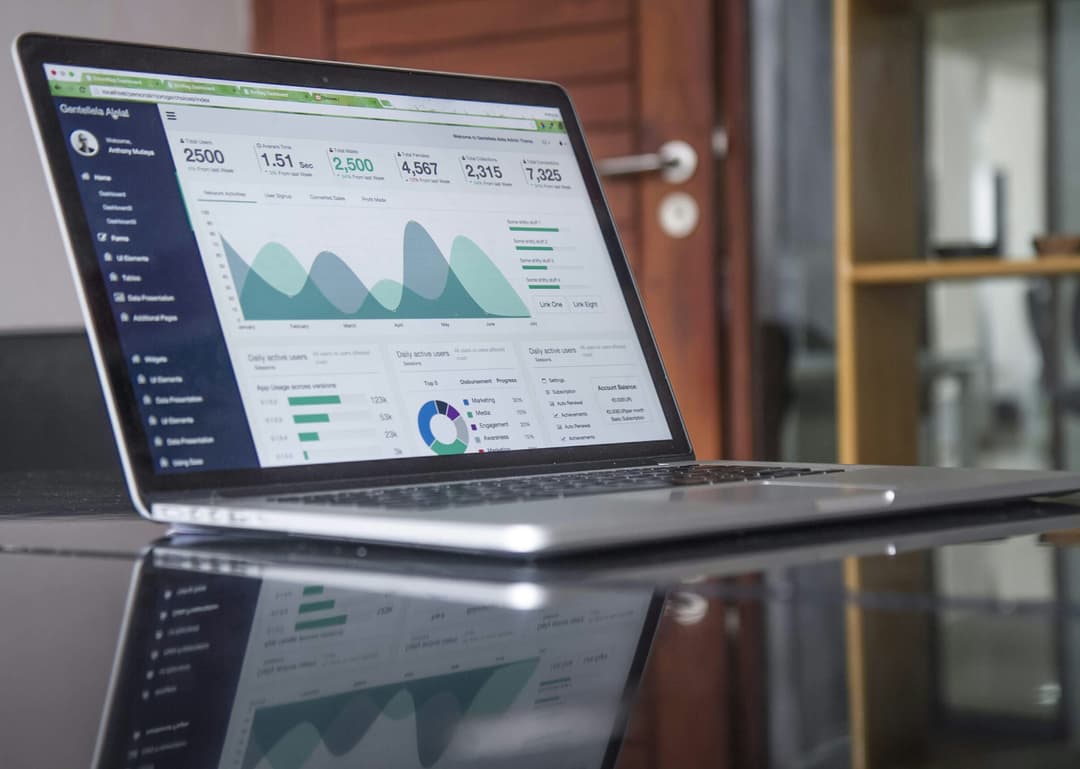 A laptop screen displaying analytics and metrics, indicating data-driven decision-making in e-commerce businesses.