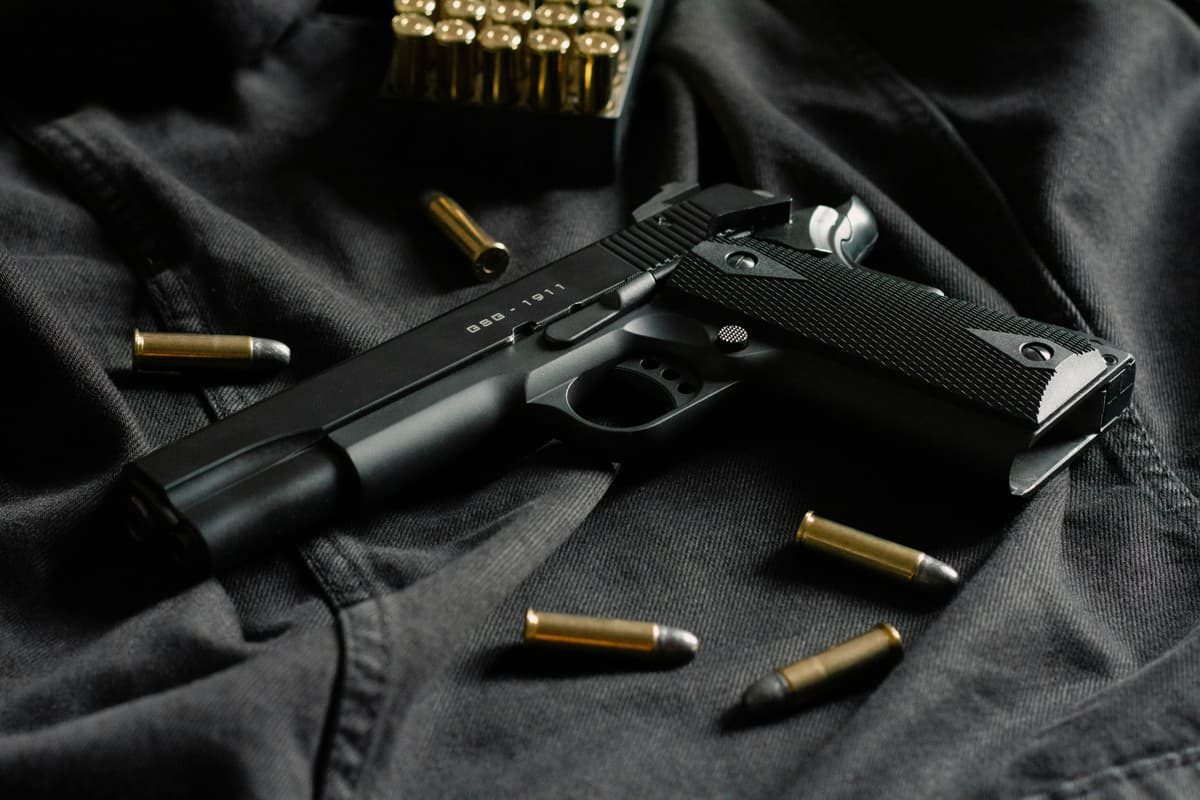 A close-up of a firearm, emphasizing its design and functionality.